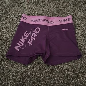 XS purple nike pros